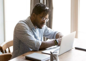 man working at computer